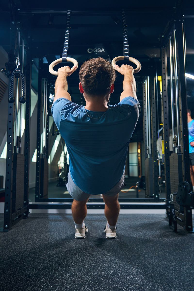 A staff member using the gym facilities.